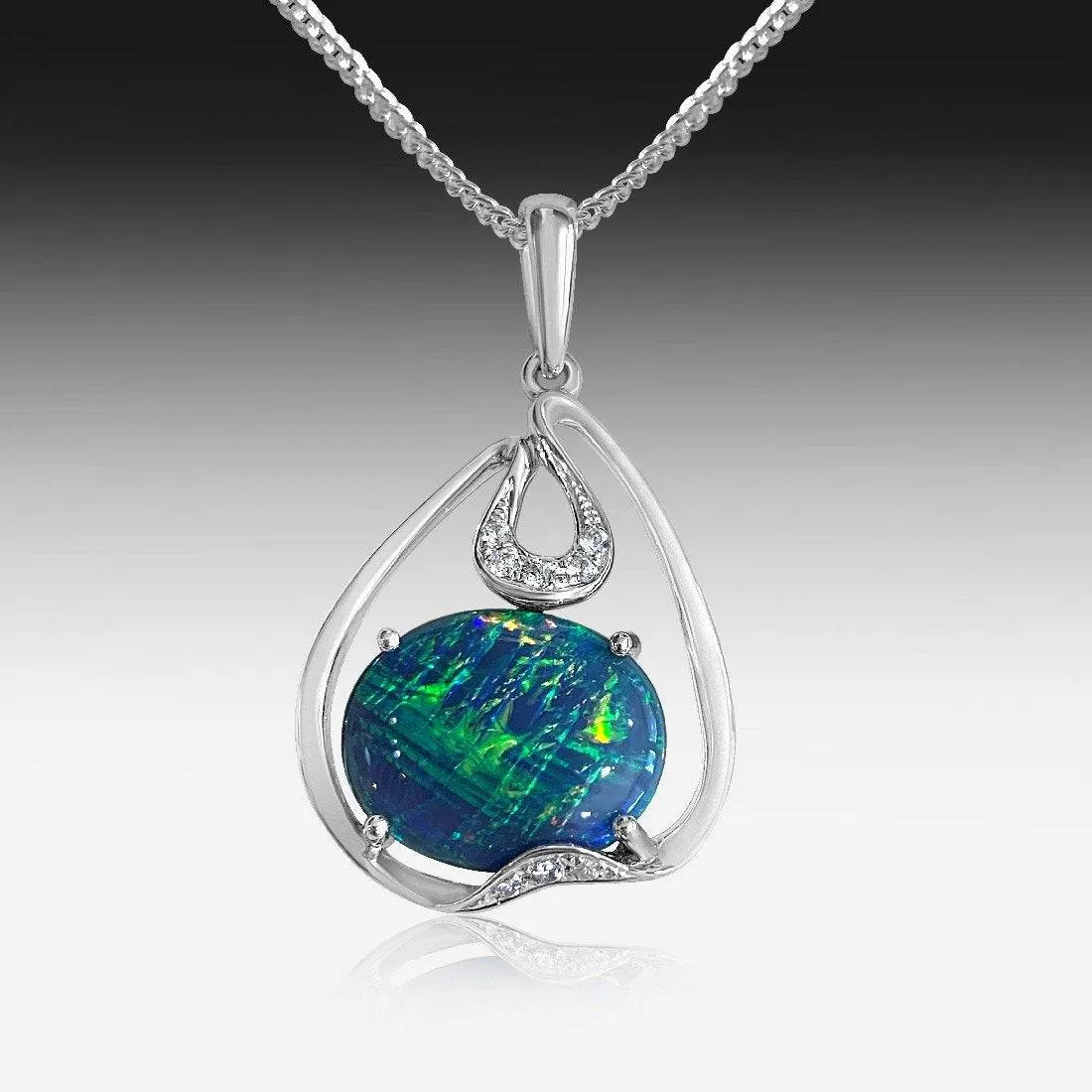 14kt White Gold Black Opal and diamond pendant