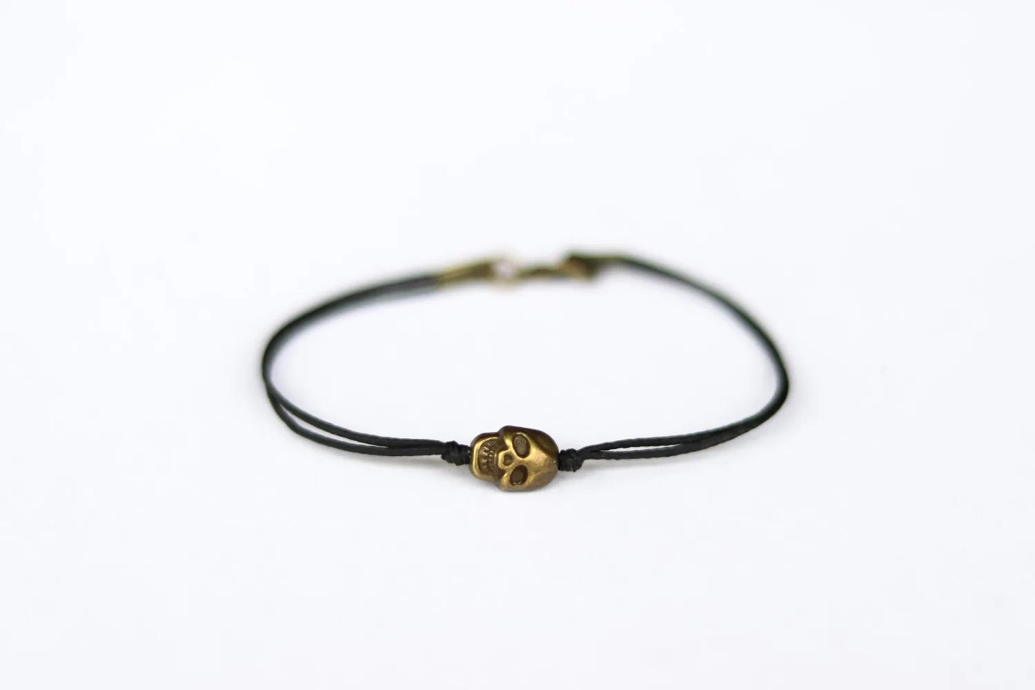 Bronze skull bead bracelet for men, black cord, gift for him