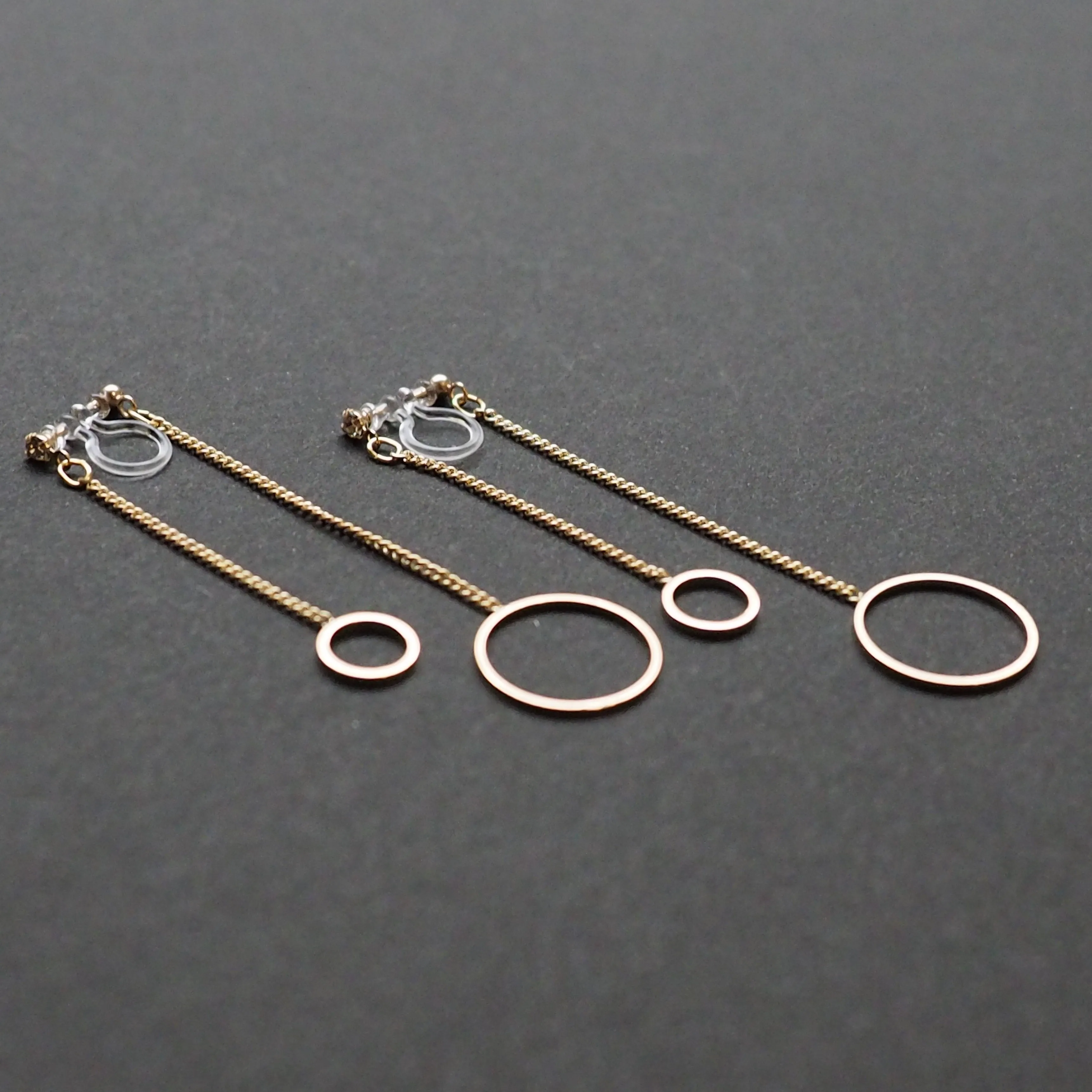 Double sided hoop invisible clip on earrings ( Gold tone )