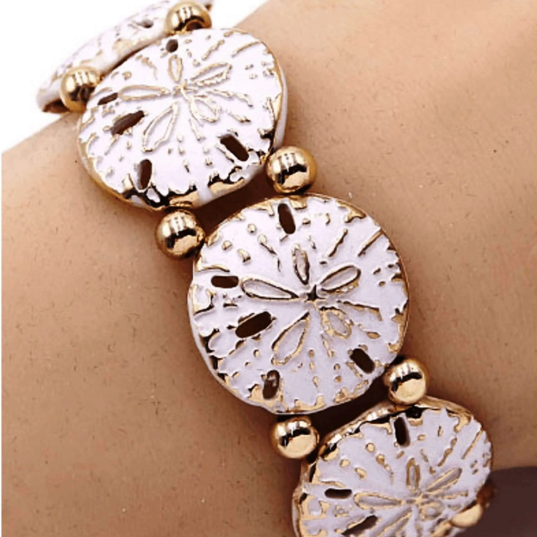 Gold Sand Dollar Stretch Bracelet with White Accent