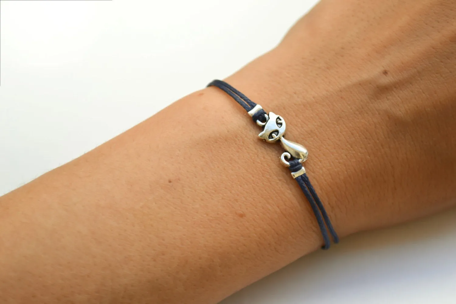 Silver cat charm bracelet, blue cord, adjustable bracelet