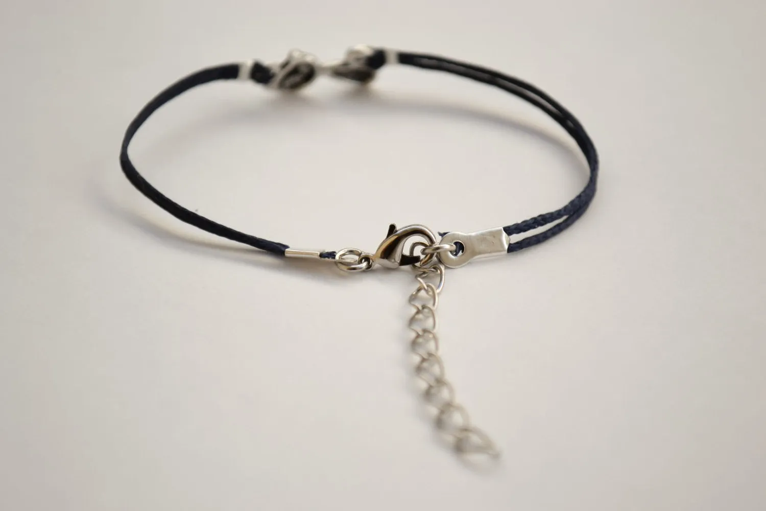 Silver cat charm bracelet, blue cord, adjustable bracelet